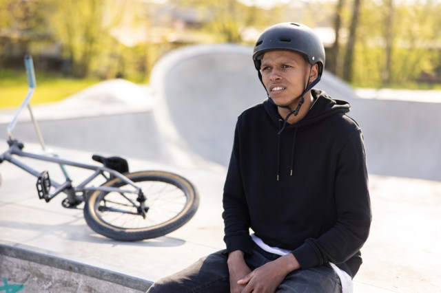 A teen who just lost a bicycle competition