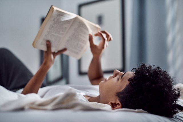 Athlete reading a book